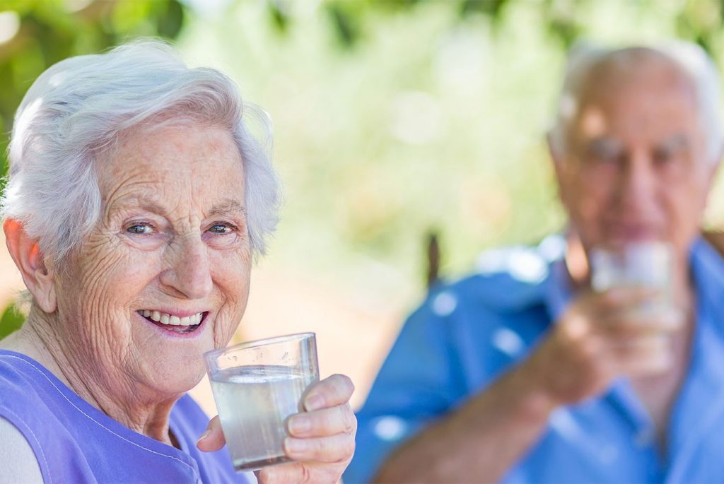 Imagine Senior Living | Senior couple drinking lemonade